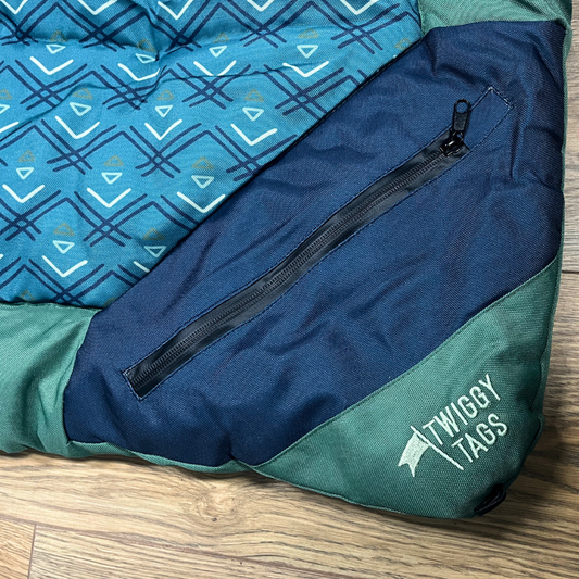 Twiggy Tags Crosslander Travel Bed For Dogs Sizes Large and Small. A rollable, portable travel bed for dogs with water resistant and hard wearing fabric, zip pocket and tent peg loops.