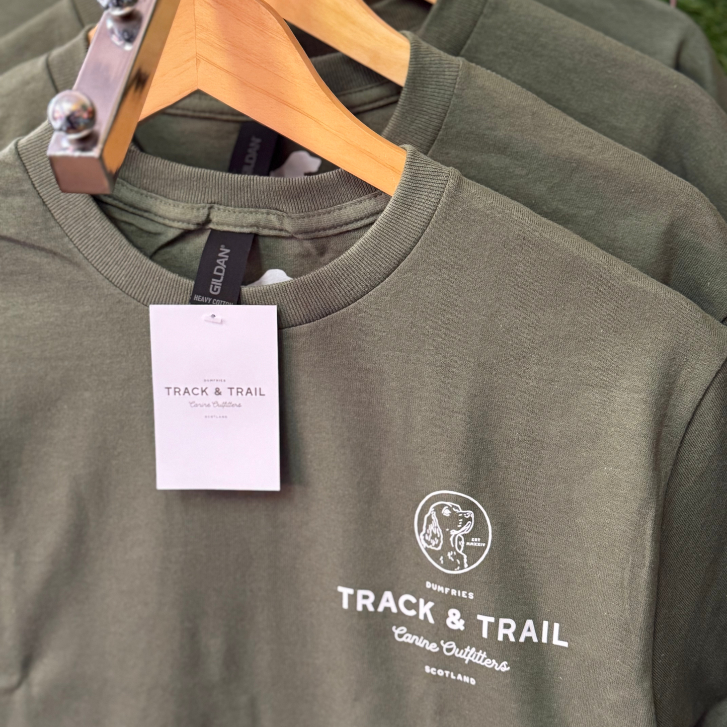 Track and Trail Canine Outfitters T shirt. Army Green T Shirt With dog stamp logo on chest and on the back