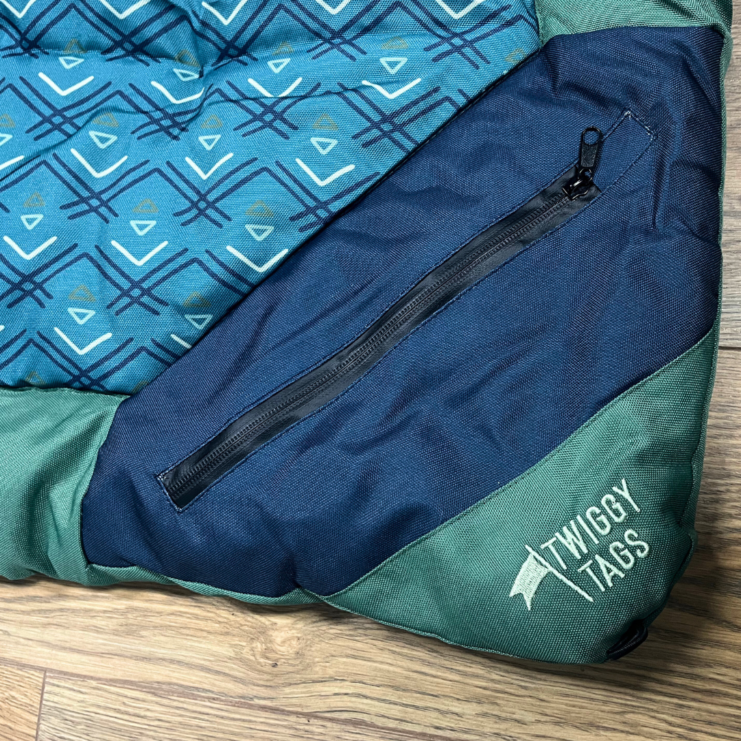 Twiggy Tags Crosslander Travel Bed For Dogs Sizes Large and Small. A rollable, portable travel bed for dogs with water resistant and hard wearing fabric, zip pocket and tent peg loops.
