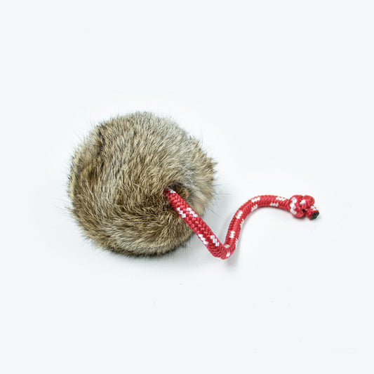 long throw rabbit fur covered ball for dogs with string toggle attached